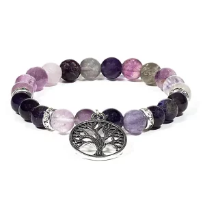 Photo d'un bracelet perle d'améthyste et de fluorite avec un pendentif arbre de vie accrocher