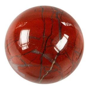 Photo d'une boule de massage en pierre de jaspe rouge